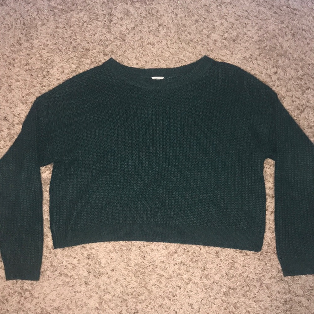 dark green sweater
